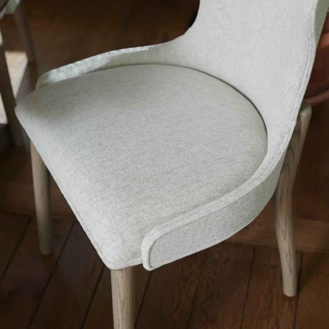 Seat of Cream Upholstered Dining Chair