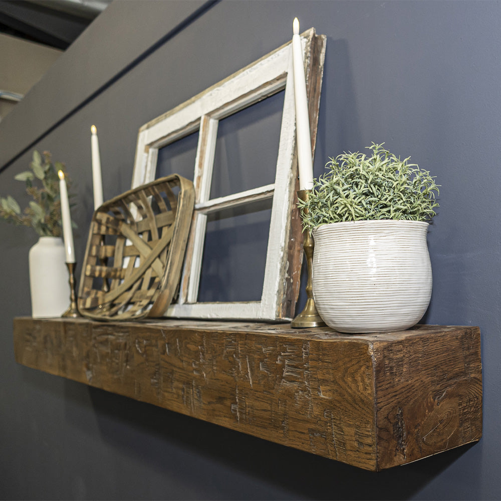 side of hand hewn mantel shelf