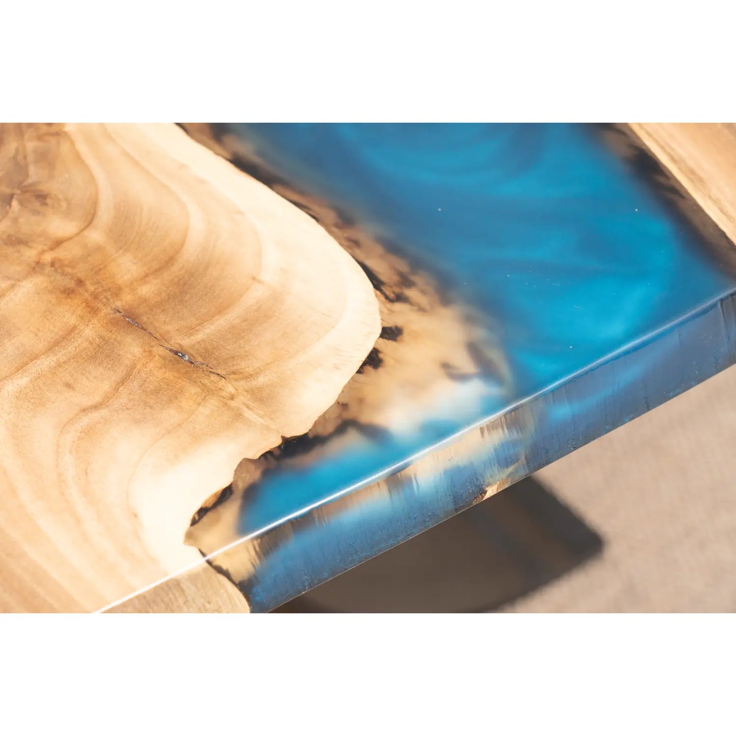 blue epoxy in walnut river table