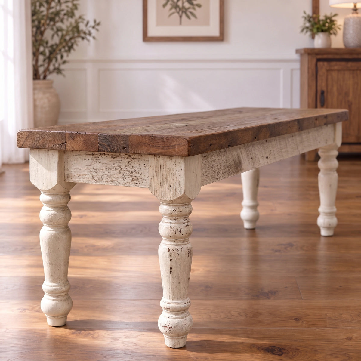 Walden Farmhouse Bench: dark stained wood top on four white distressed, turned legs.