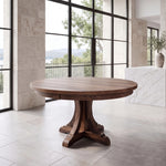 Weatherby wood dining table in modern room with large windows, marble floors, and mountain view.