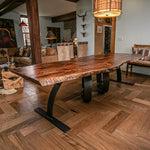 Custom live edge dining table with unique steel base