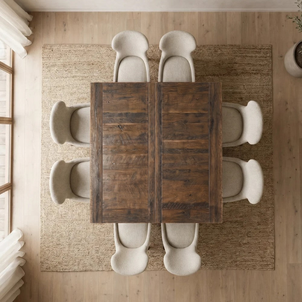 Top-down view of the Hawthorne solid wood square dining table with eight upholstered chairs