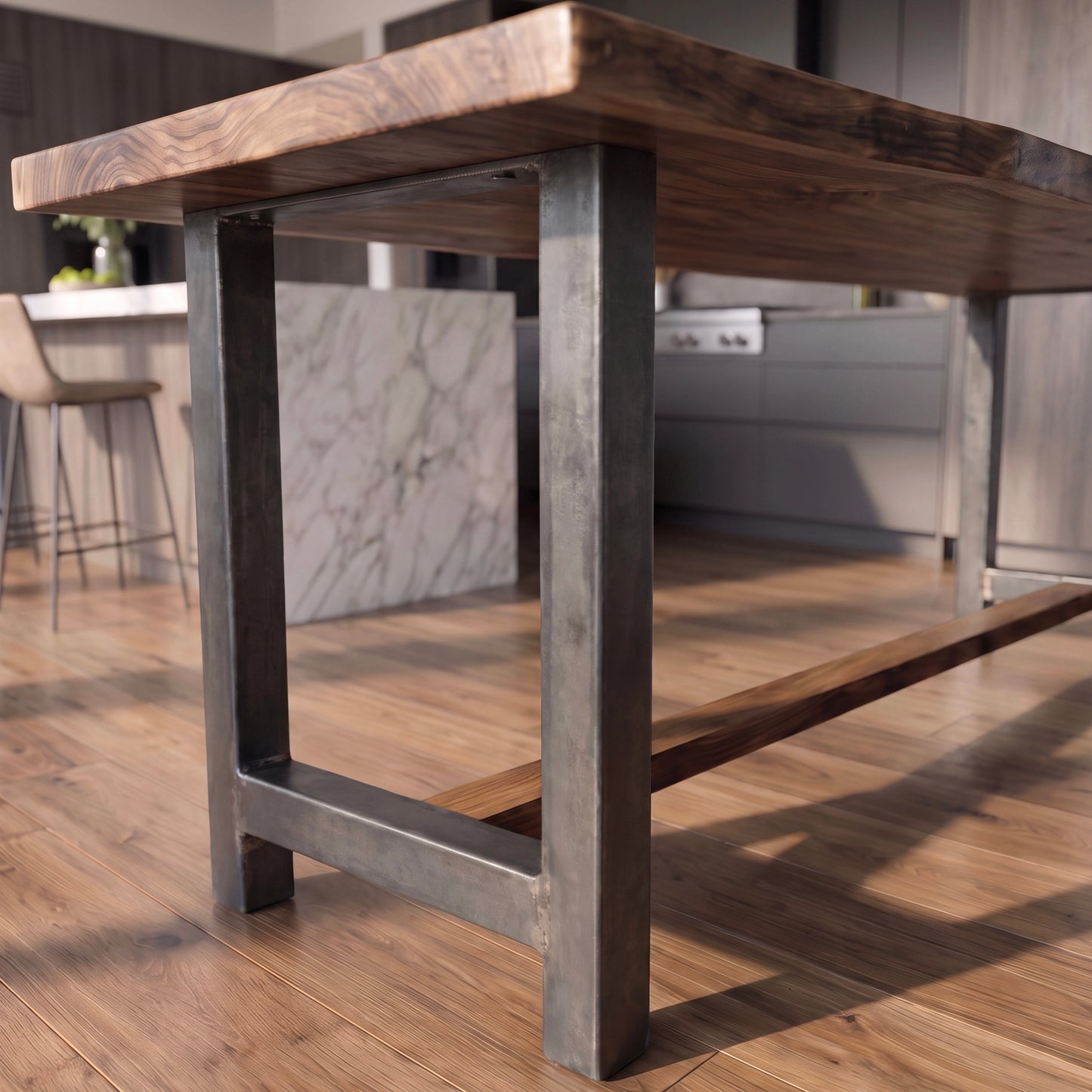 Live edge walnut counter table with metal legs in a modern kitchen; island and chair blurred behind.