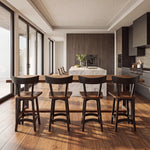 Modern kitchen with wood floors, dark cabinets, walnut island, barstools, and bright windows.