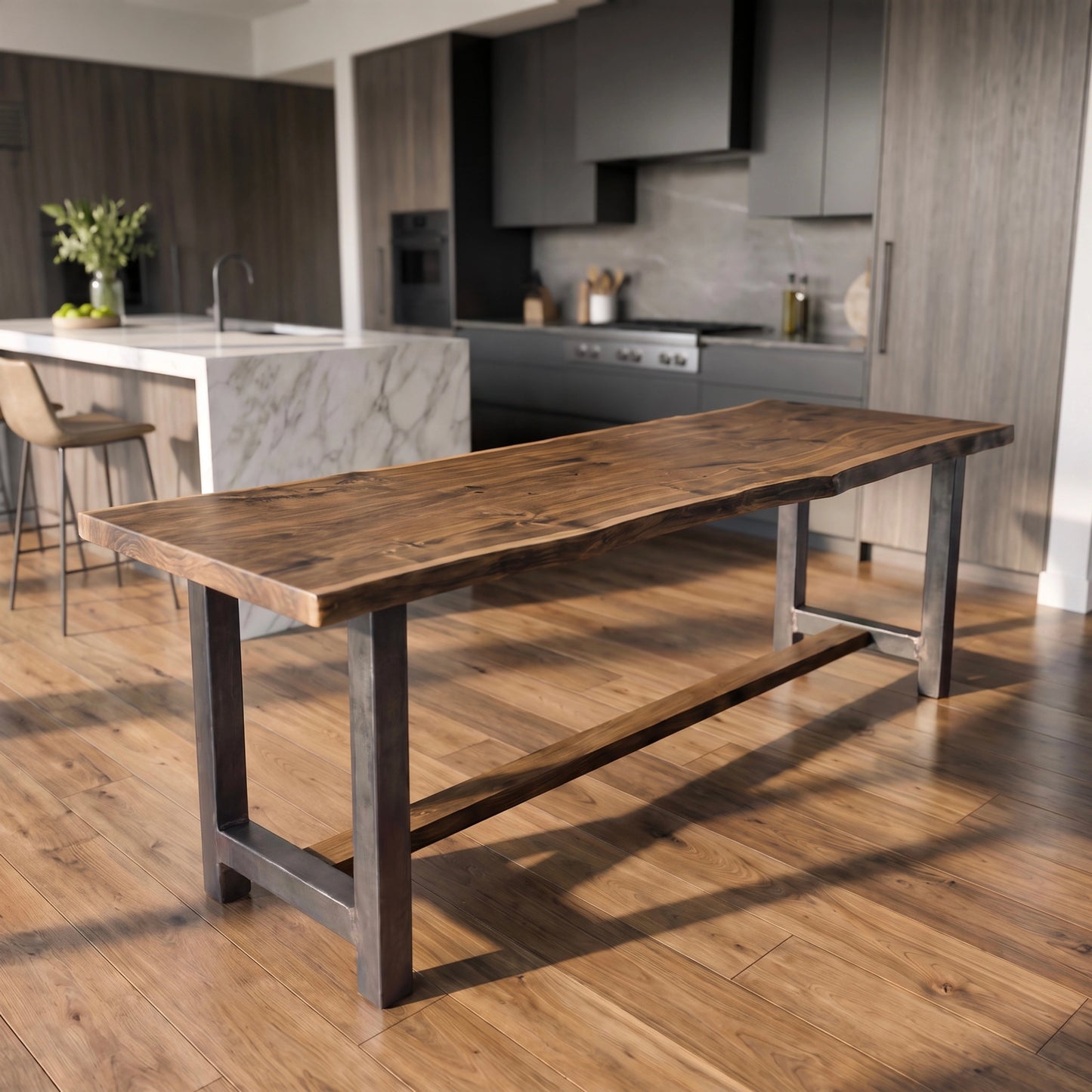 Modern kitchen with wood floors, walnut counter table, and a marble island with two chairs.