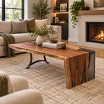 Live edge epoxy waterfall coffee table on a textured rug.