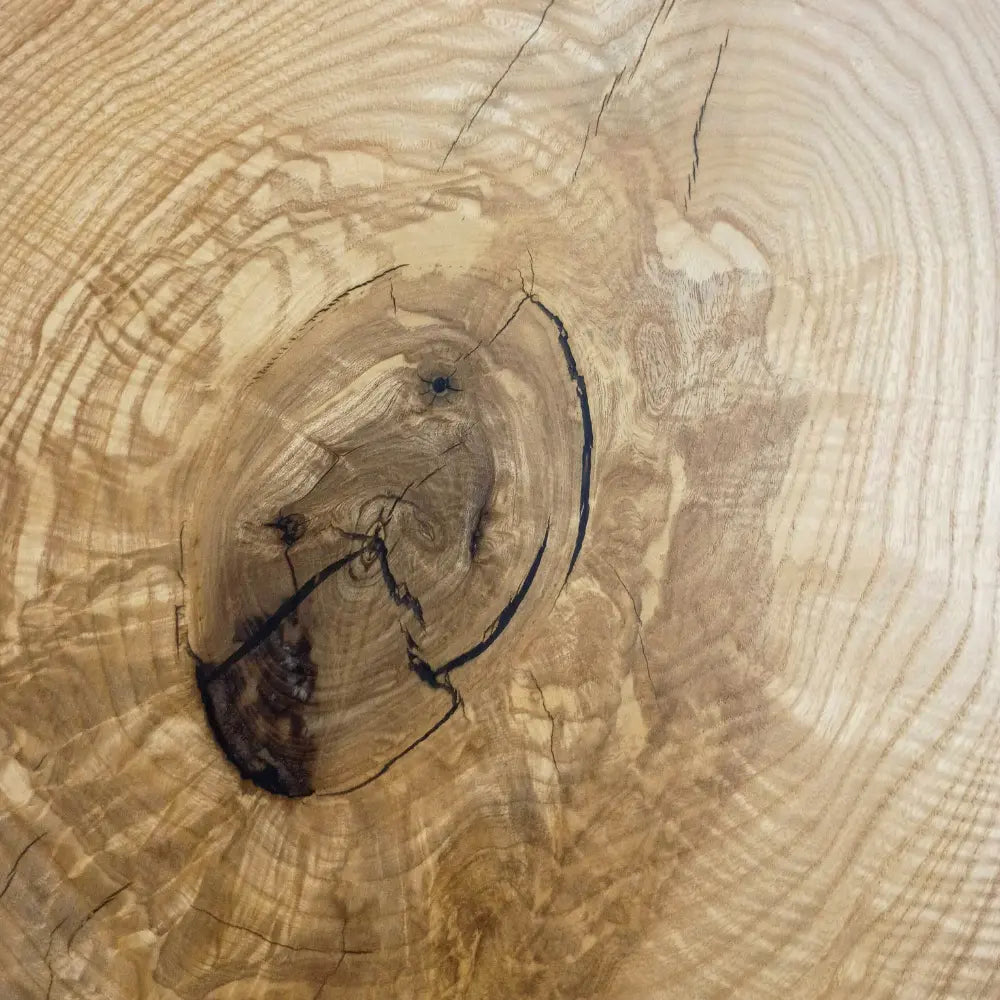Close-up of Live Edge Ash Console Table highlights unique grain, knot, cracks, and rich texture.
