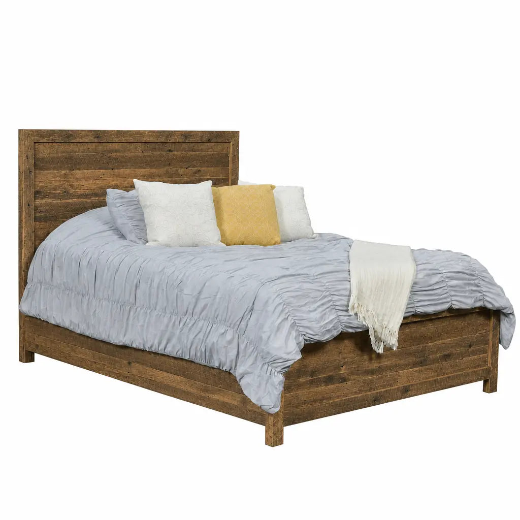 Madison bed with high headboard, gray comforter, 4 pillows, and a cream throw at the foot.