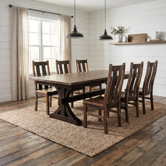 Rustic dining room with long table, jute rug, pendant lights, and sunlight through beige curtains.