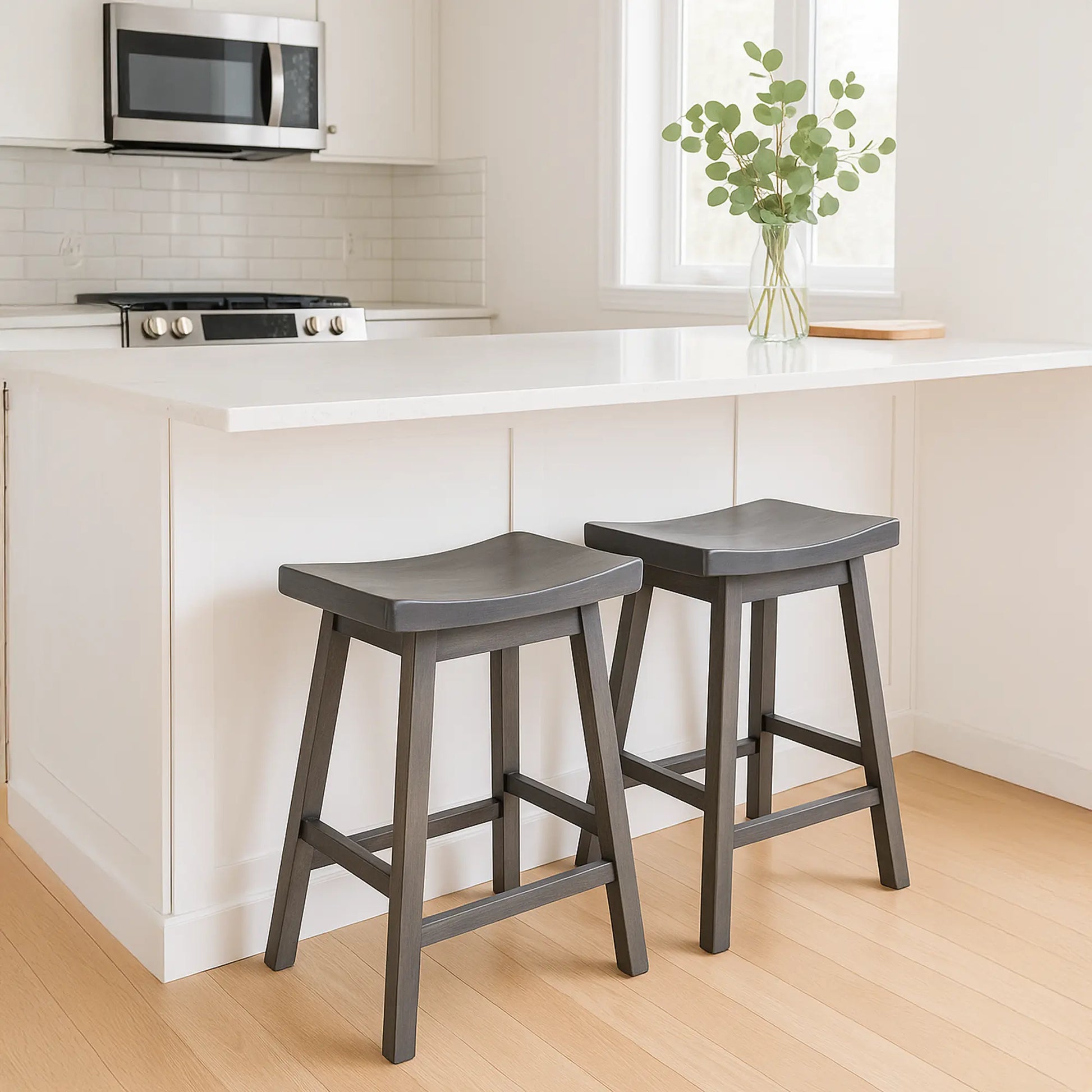 gray wood bar stools at kitchen island