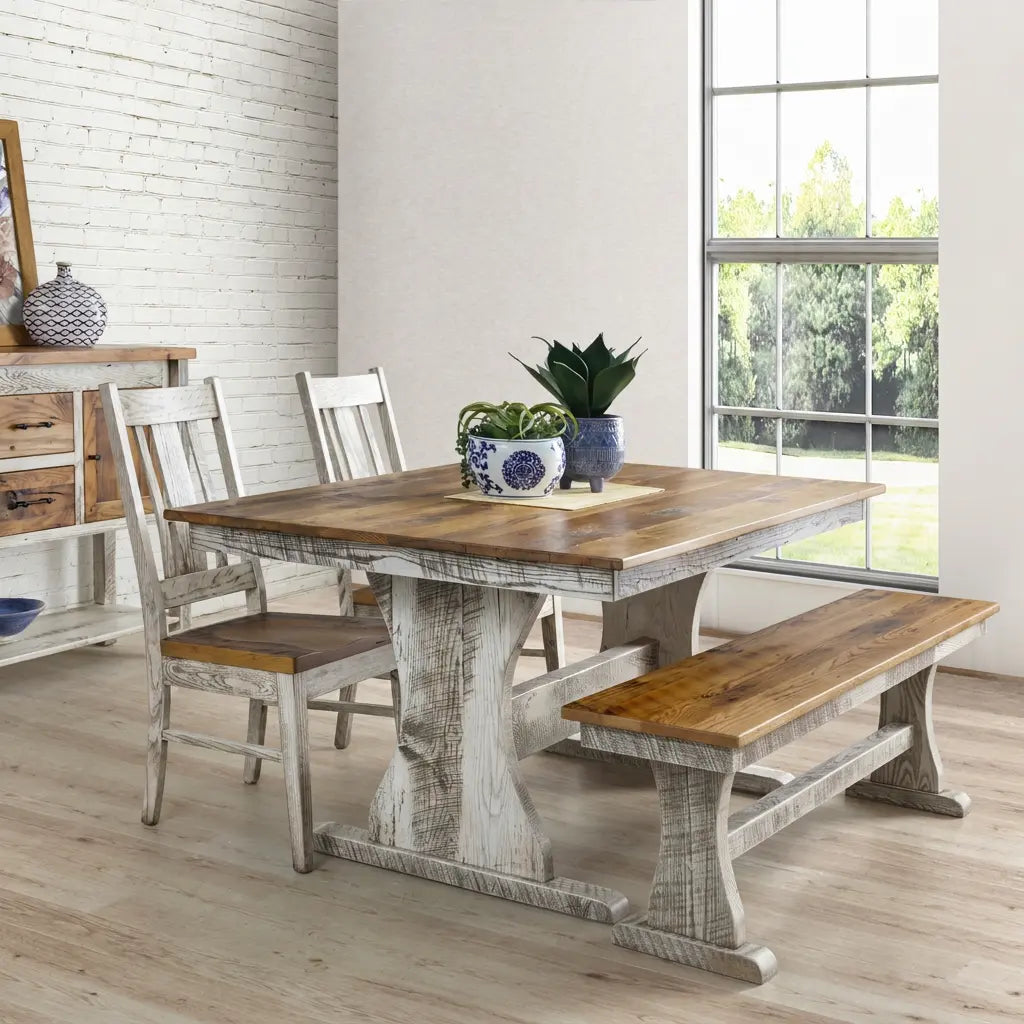 Rustic dining set with bench by a window, plants on table, and light-filled room.