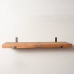 Rustic Pine Shelf with Iron Brackets