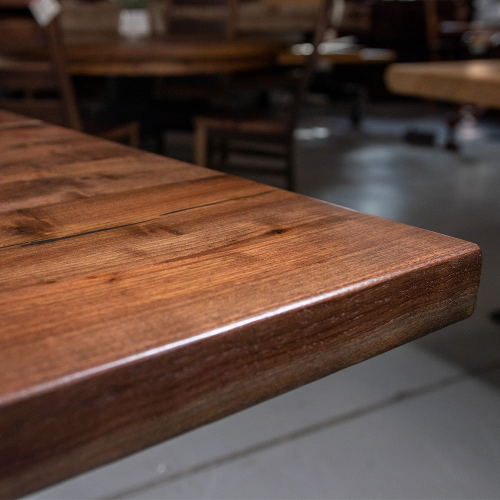 edge of walnut wood dining table