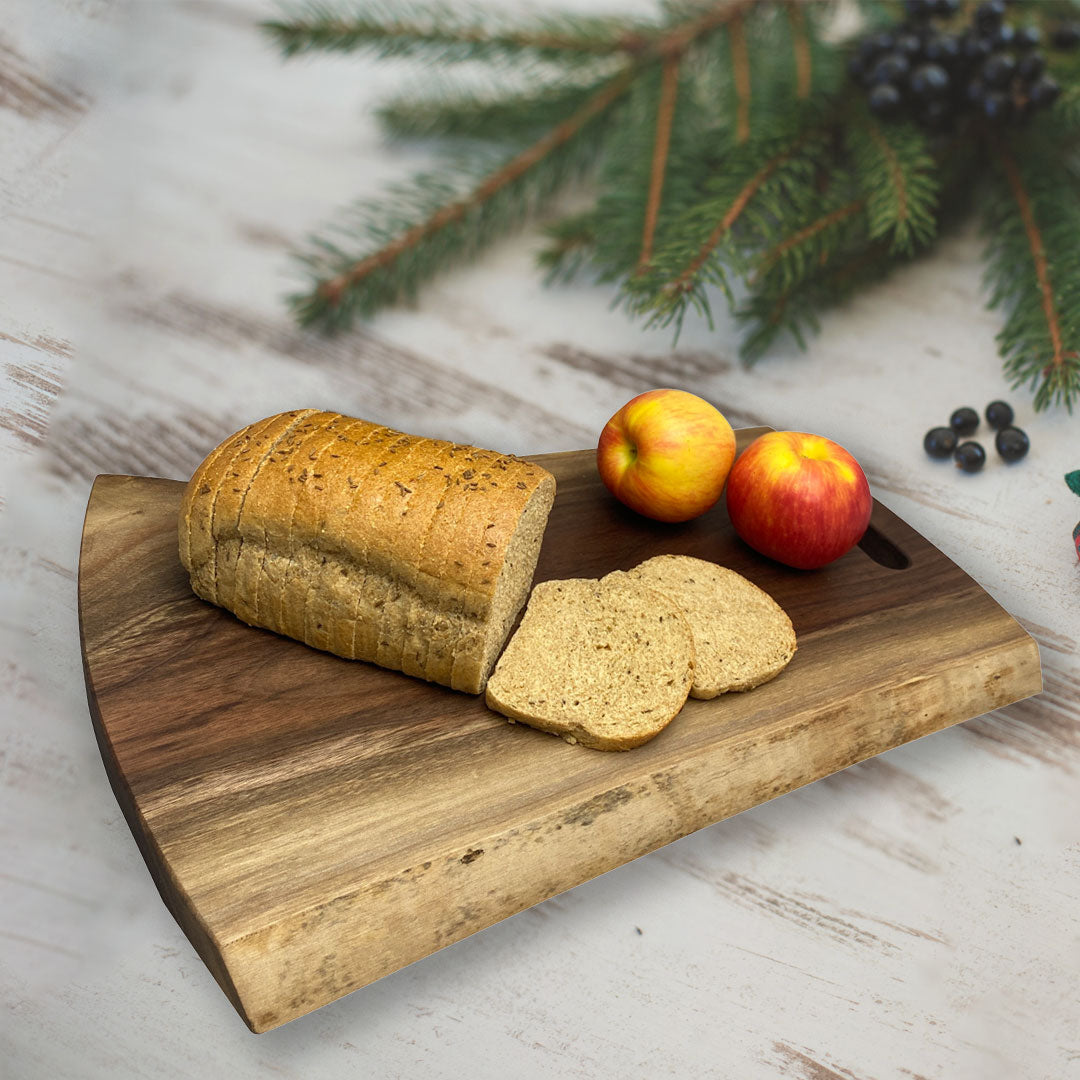 live edge walnut charcuterie board on a table