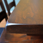 corner of rustic cherry dining table