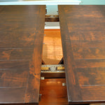 Extendable dining table mechanism in solid wood